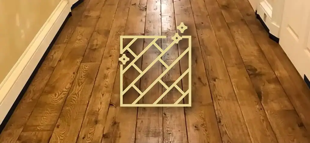 Geometric lattice logo on wooden hardwood flooring