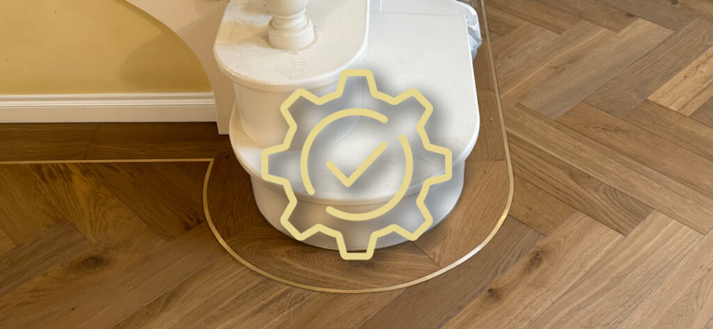 Yellow neon gear icon with checkmark on white surface
