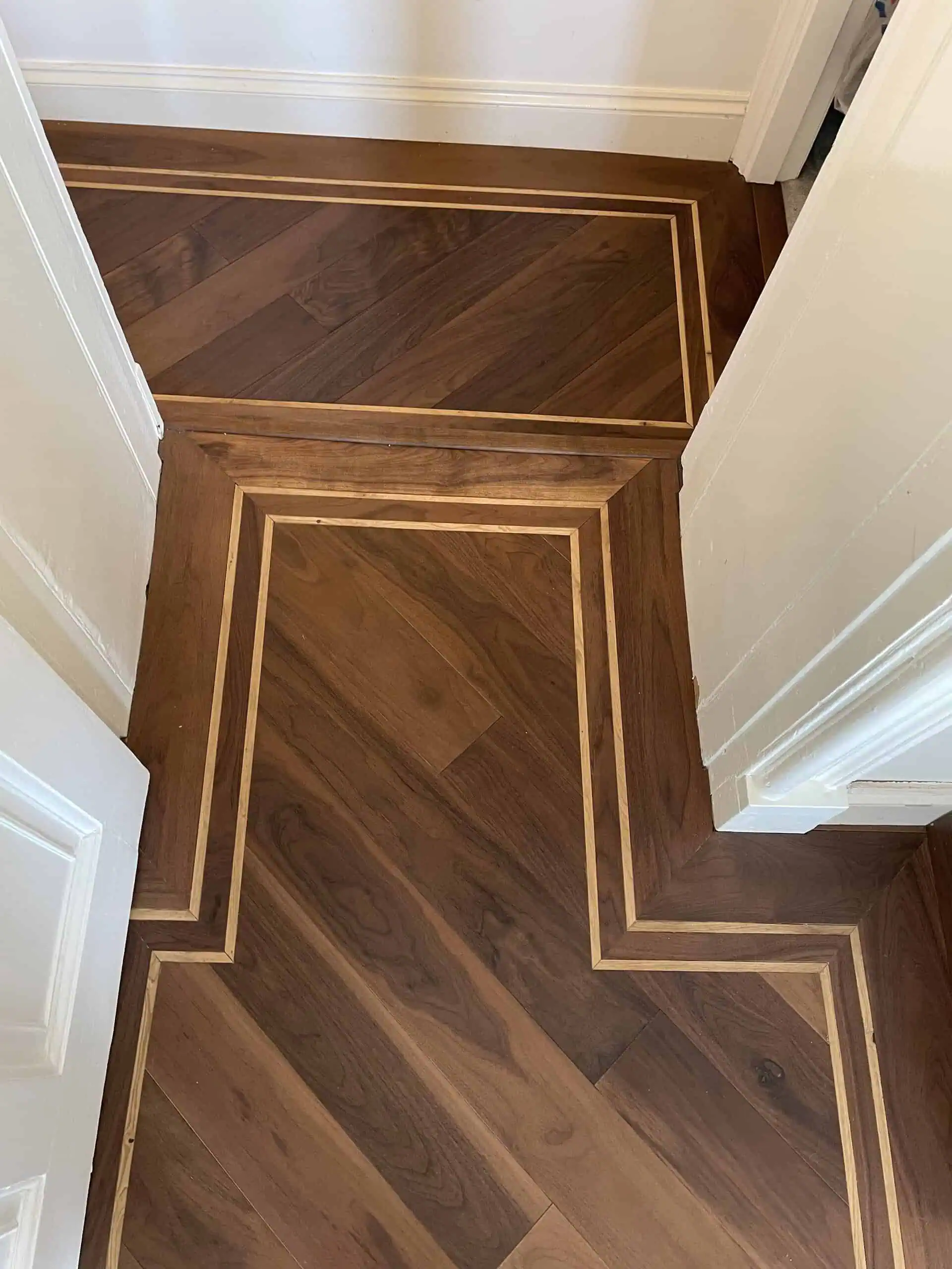 Hardwood floor with decorative inlaid border pattern