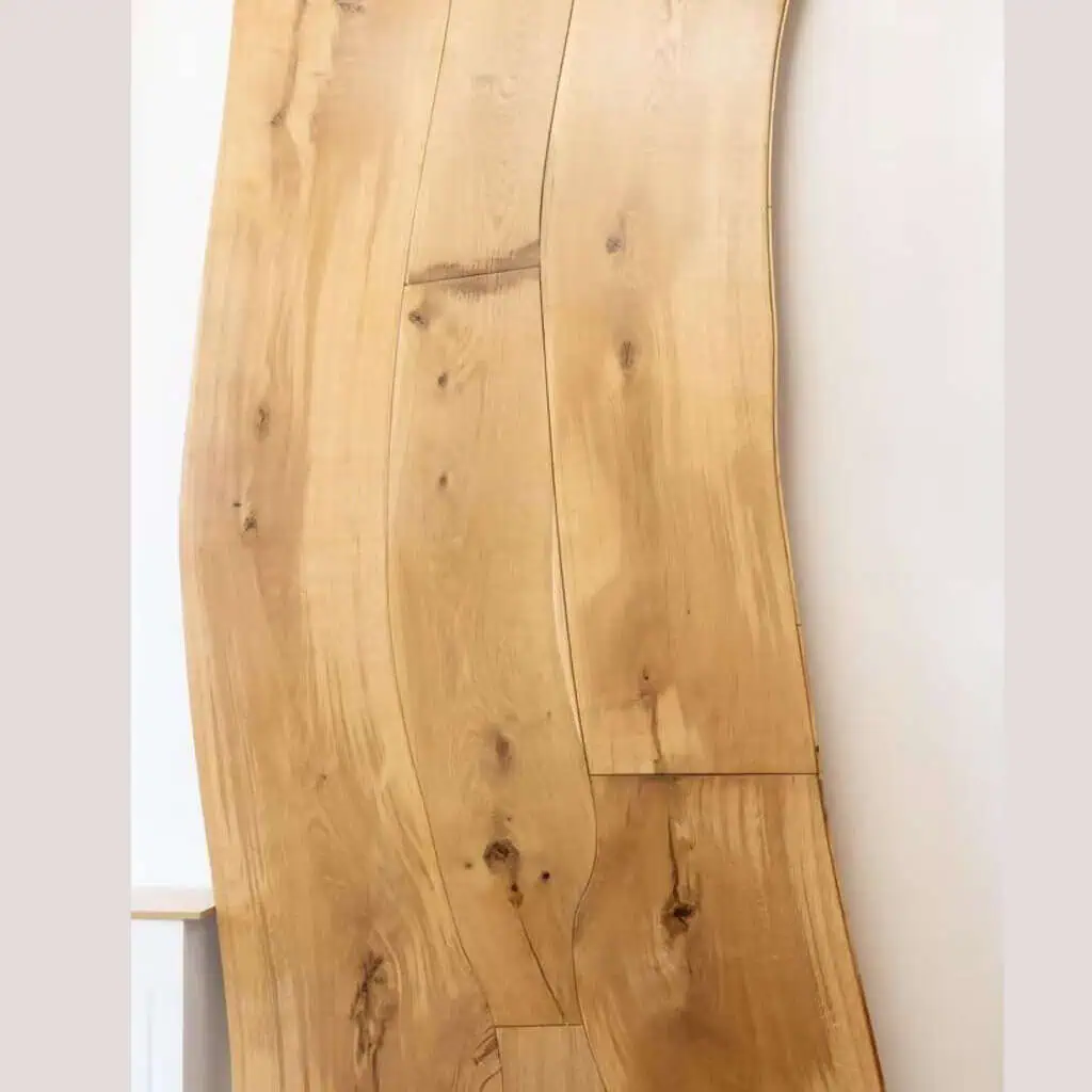Natural wood flooring planks with knots and grain patterns