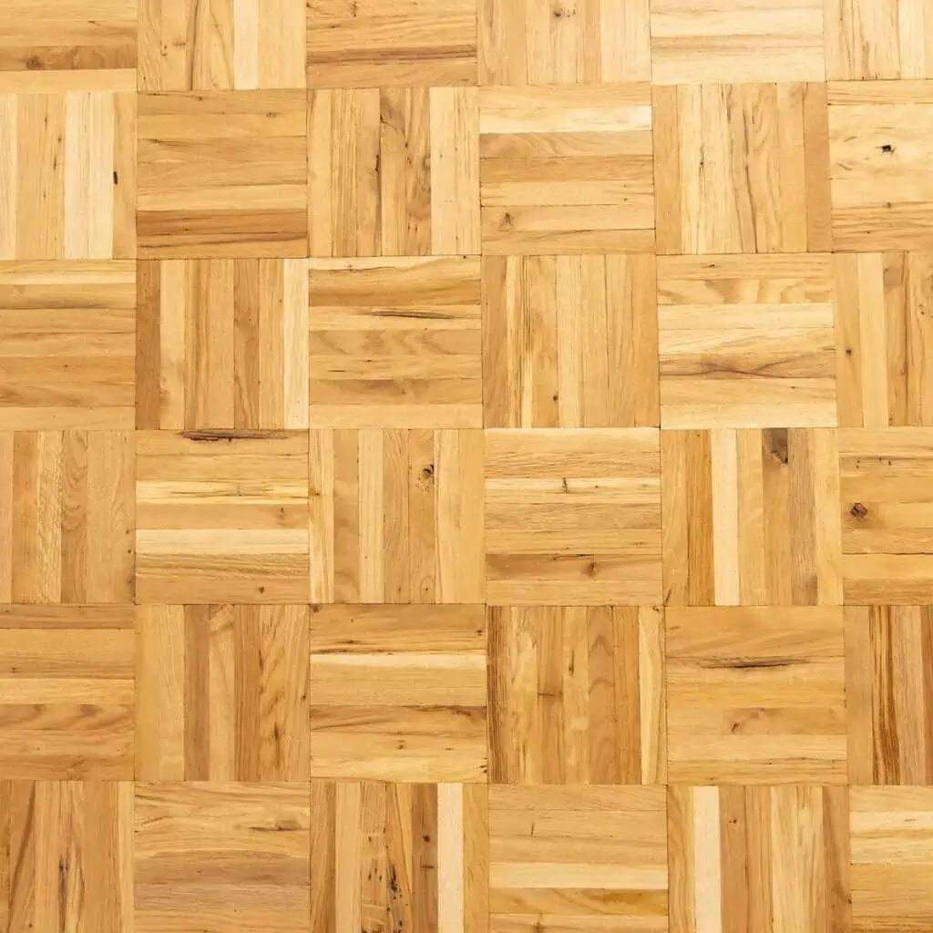 Natural wood parquet flooring in herringbone pattern