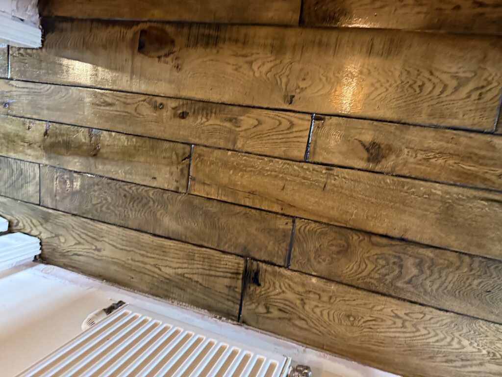 Wooden hardwood flooring planks with natural grain patterns